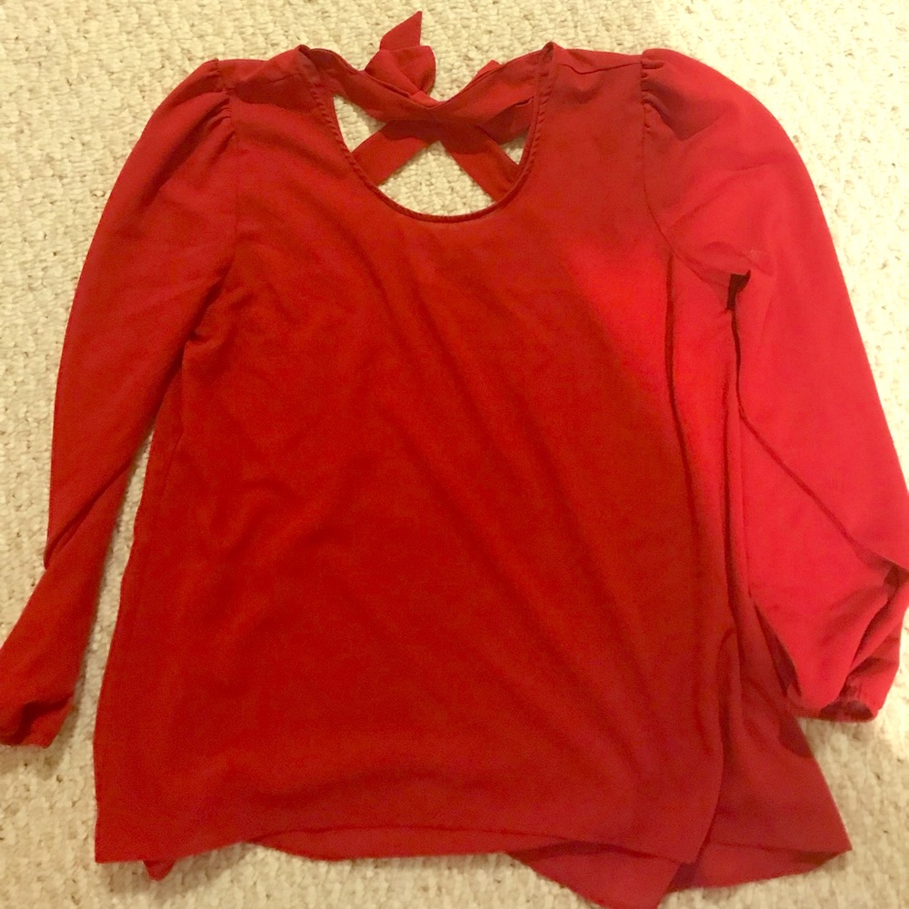 Red long sleeve shirt with bow on back